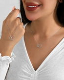 گردنبند استیل زنانه طرح دو حلقه درهم نگیندار